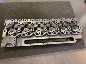 Cummins C8.3-C350,  QSC8.3-CM554 variklio galvutė 46298847 Cummins C8.3-C350,  QSC8.3-CM554 variklio galvutė 46298847