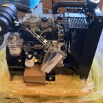 CAT C1.1 / Perkins 403A-11 variklis su radiatoriumi – vaizdas iš šono