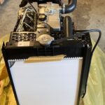 CAT C1.1 variklis 403A-11 – radiatoriaus pusė